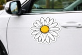 Daisy flower sticker on a car door