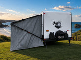 Black and white palm decal on back of caravan