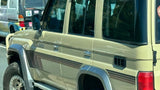 Brown landcruiser stripes on desert landcruiser
