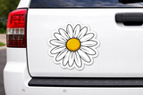 Daisy flower decal on a car's rear panel