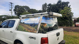 Mega Sticker Store custom vinyl wrap featuring a landscape photo on a white 4WD ute canopy for outdoor travel style.