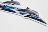 Mega Sticker Store dolphin and wave vinyl decal graphic for motorhomes and boats with a glossy protective finish.