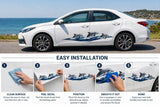 Mega Sticker Store dolphin wave vinyl decal applied to a white car, showing installation steps on a flat surface.