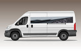 Mega Sticker Store geometric abstract grey and charcoal vinyl decal applied to the side of a white camper van