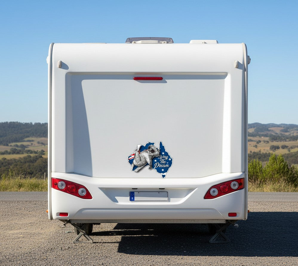 Mega Sticker Store vinyl decal of a koala on an Australian flag map applied to the back of a white motorhome.