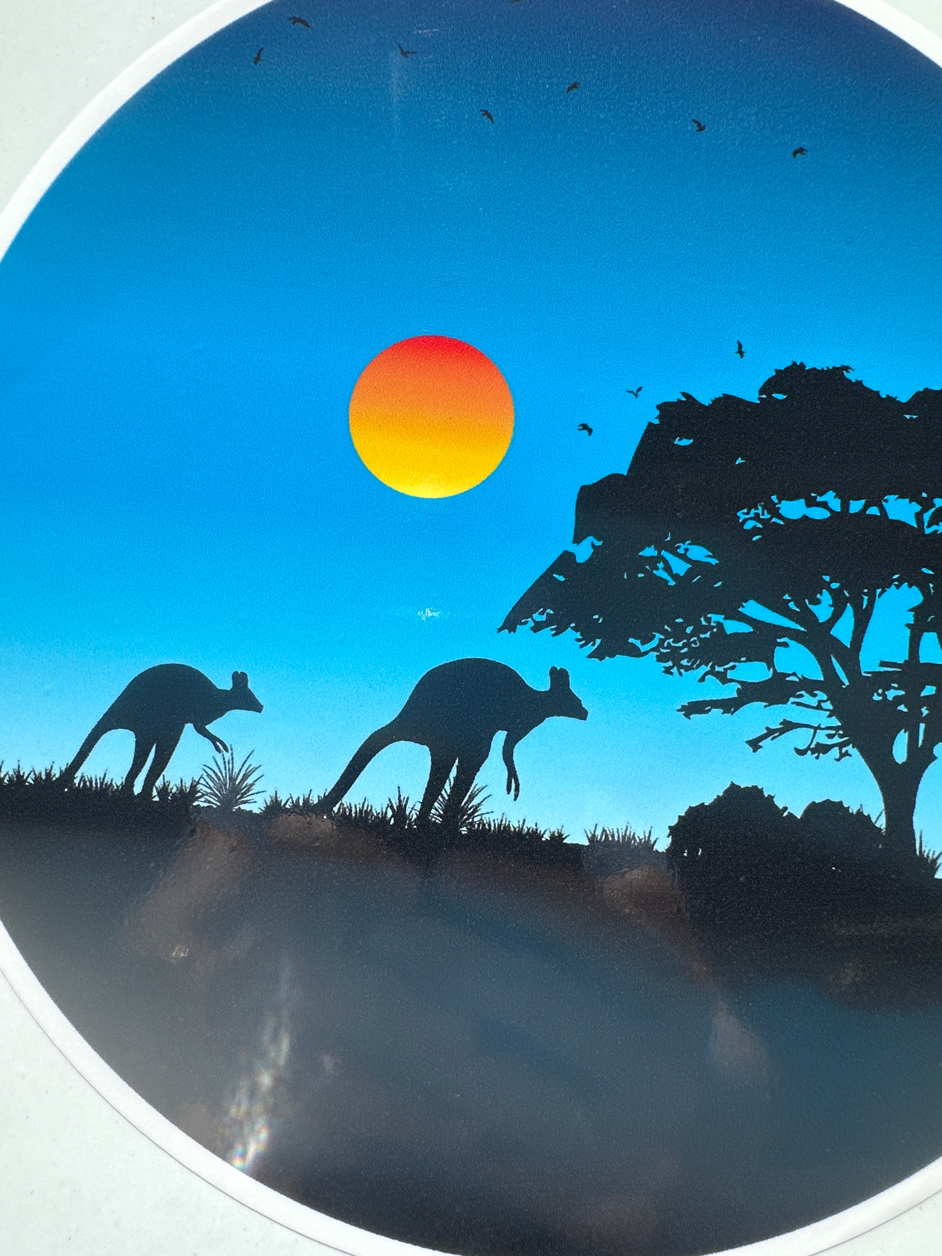 Australian outback sticker ith kangaroos and sunset blue background