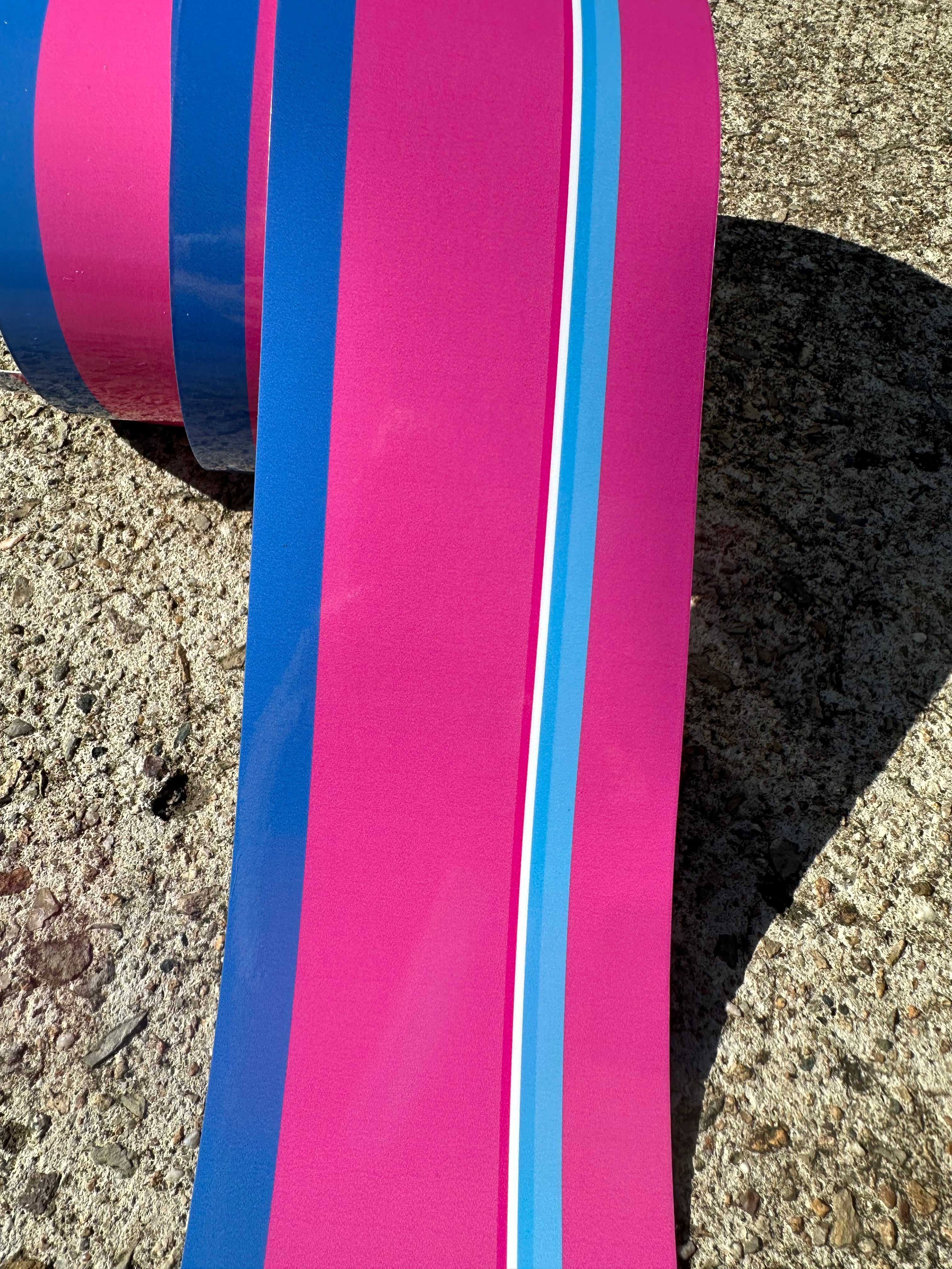 close up photo of pink vehicle pinstripe
