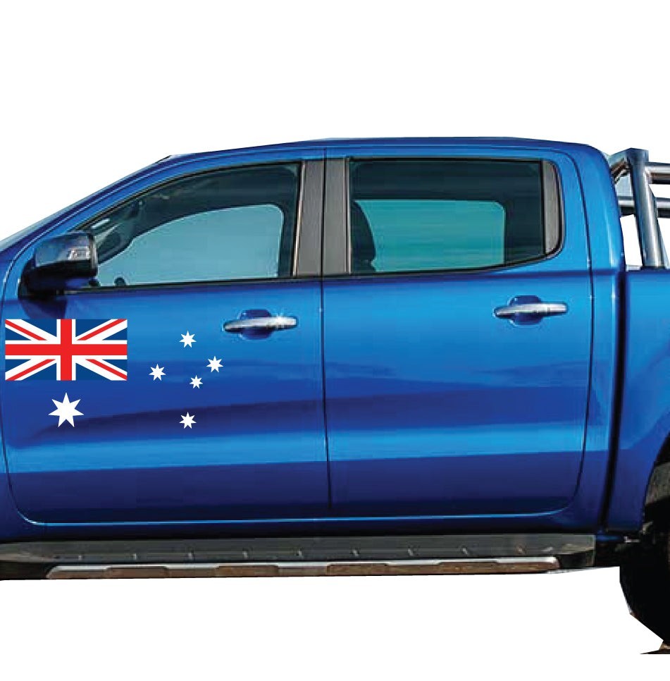 Mega Sticker Store Australian flag Southern Cross vinyl decal applied to the side panel of a blue 4WD ute