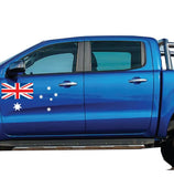 Mega Sticker Store Australian flag Southern Cross vinyl decal applied to the side panel of a blue 4WD ute