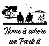 Mega Sticker Store black vinyl decal featuring a couple in chairs, a tree, and the text Home is where we park it.