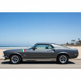 Mega Sticker Store Italian flag racing stripe decal applied to the side of a grey classic car parked by the beach