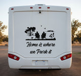 Mega Sticker Store black vinyl decal of a couple in chairs with the text Home is where we park it on a motorhome